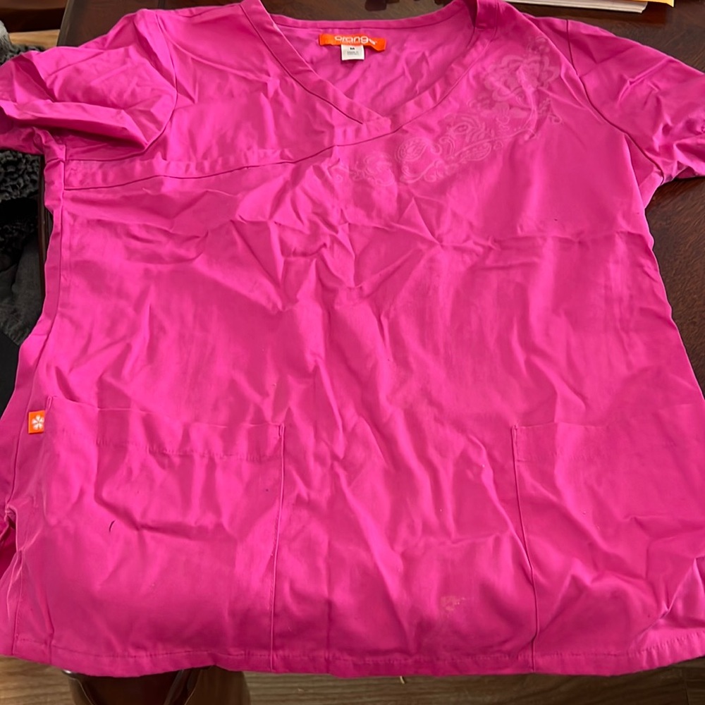 Size Medium top women’s scrubs and size Small bottoms